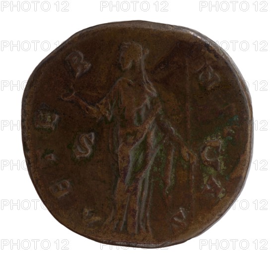 Sestertius, posthumous issue for Faustina the Elder 98–141; Roman empress 138–141, issuer Antoninus Pius 86–161; Roman emperor 138–161. Obverse: bust of Faustina I in drapery facing right, legend DIVA • FAVSTINA. Reverse: Juno veiled standing left, right hand outstretched, holding a scepter in left; legend AETERNITAS in fields SC, after 141, Roman Empire, Rome. Coin: bronze; diameter 29.5–30.5 mm; weight 27.73 g; axis 0°., A round, worn metal object with a dark brown surface and patches of greenish discoloration showing a faint, raised outline of a standing human figure draped in flowing garments, with one arm extended and the other holding a long vertical element; the surface shows several shallow, irregular indentations and raised marks around the figure, and the edge is slightly irregular and darker.