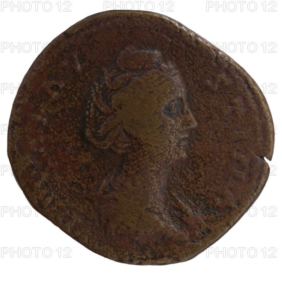 Sestertius, posthumous issue for Faustina the Elder 98–141; Roman empress 138–141; issuer: Antoninus Pius 86–161; Roman emperor 138–161. Obverse: Bust of Faustina I in drapery facing right, legend DIVA FAV–STINA. Reverse: Vesta standing left, holding in her outstretched right hand a statuette of Athena palladium and a scepter in her left, legend A VGV–STA, in SC. Fields. After 141, Rome, Roman Empire. Bronze coin; diameter 29.5–32.0 mm, weight 21.60 g, axis 180°., A round, worn coin with an uneven edge showing a raised profile of a person facing right; the surface has a textured, pitted appearance with areas of smoother relief. The visible colors are brown, dark brown, reddish-brown, and patches of yellowish-brown. The profile shows hair pulled back and some suggestion of facial features and clothing folds, all rendered in the same metal tones against the coin’s darker background.