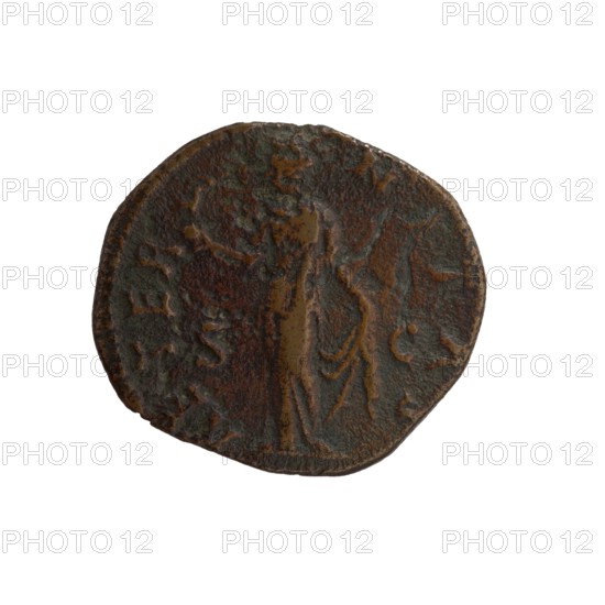 Dupondius/as, Faustina the Elder 98–141; Roman empress 138–141 posthumous issue, Antoninus Pius 86–161; Roman emperor 138–161 issuer. Obverse: Bust of Faustina I in drapery facing right, legend DIVA FAVSTINA all around. Reverse: Aeternitas standing left; in his outstretched right hand he holds a globe with a phoenix, with his left hand he raises the hem of his robe, legend AETERNITAS all around, in SC. After 141, Rome. Coin; diameter obv. 22.0 mm, rev. 24.5 mm; weight 10.00 g; axis 180°., A round, worn coin with an irregular edge shown against a white background, displaying a raised central figure in profile standing and draped in flowing garments; the surface shows textured corrosion and pitting with areas of smoother relief, and the visible colors include dark brown, reddish-brown, greenish-brown, and some warmer bronze tones.
