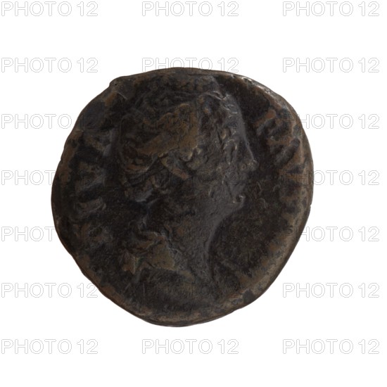 Dupondius/as; Faustina the Elder 98–141; Roman empress 138–141 posthumously; Antoninus Pius 86–161; Roman emperor 138–161 issuer. Obverse: Bust of Faustina I in drapery facing right, legend DIVA • FAVSTINA. Reverse: Aeternitas personification in a veil sits on a star-studded globe to the left, right hand outstretched, holding a scepter in the left; legend AETER•N ITAS around, in the SC. section. After 141, Roman Empire; Rome mint. Coin; diameter 24.0–25.5 mm, weight 8.50 g, axis 180°., A dark round object with an uneven surface showing worn raised shapes and contours, displaying a mix of dark brown and black tones with some lighter brown highlights; the object sits against a white background.
