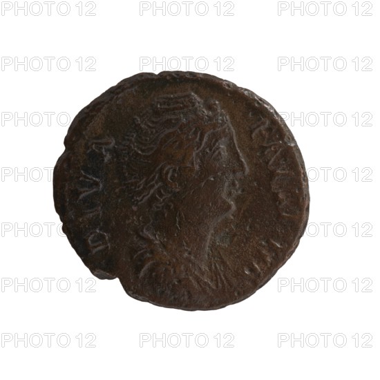As/dupondius; Faustina the Elder 98–141, Roman empress 138–141 posthumous; Antoninus Pius 86–161, Roman emperor 138–161 issuer; obverse: Bust of Faustina I in drapery facing right, legend DIVA · FAVSTINA; reverse: Aeternitas personification in a veil sits on a star-studded globe to left, right hand outstretched, holding a scepter in left, legend A ETER N I T AS in the exergue; after 141, Rome, Roman Empire; coin as/dupondius, diameter 24.0–26.0 mm, weight 8.40 g, axis 180°., A round, worn coin with a dark brown and almost black patina showing a raised profile of a person's head in relief, with visible hair details and a faint suggestion of a laurel or headband, set against a lighter brown background on parts of the surface and irregular edge wear.