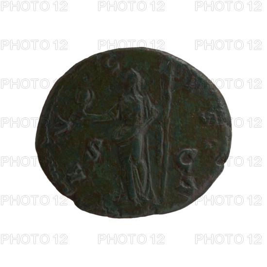 Dupondius/as, Faustina the Elder 98–141; Roman empress 138–141 posthumous, Antoninus Pius 86–161; Roman emperor 138–161 issuer. Bust of Faustina I in drapery facing right, inscription DIVA · FAVSTINA all around; reverse: Vesta standing left, holding a statuette of Athena palladium in her outstretched right hand, and a long torch in her left, inscription A · V · G · VSTA all around, in SC. Fields. After 141. Roman Empire. Bronze coin; diameters: 24.5 mm and 28.5 mm; weight 10.90 g; axis 195°., A round, dark greenish-brown coin with a worn, textured surface showing a standing human figure in relief near the center; the figure appears draped and holds a long vertical object beside them while extending an arm toward a small raised element to the left. The coin edge is uneven and slightly irregular, and the overall coloration includes tones of dark green, brown, and hints of black with lighter green highlights on raised areas.