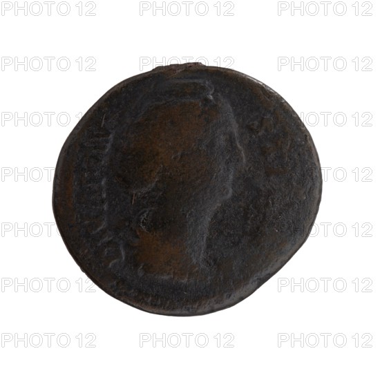 Dupondius/as; Faustina the Elder 98–141; Roman empress 138–141 posthumously; Antoninus Pius 86–161; Roman emperor 138–161 issuer. Obverse: Bust of Faustina I in drapery facing right, inscription DIVA FAV–STINA around. Reverse: Juno in diadem and veil standing left, holding a patera in her outstretched right hand and a long sceptre in her left; legend I-V-N-O all around, in SC fields. After 141 CE, Roman Empire; Rome. Coin dupondius/as: diam. 25.5–27.0 mm, weight 11.50 g, axis 180°., A round, worn coin with an uneven, textured surface showing a faint raised profile of a head; the coin displays dark brown and black tones with some lighter brown patches and a slightly irregular edge.