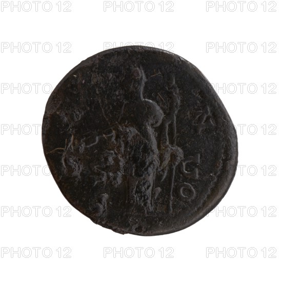 Dupondius/as; Faustina the Elder 98–141, Roman empress 138–141 posthumous; Antoninus Pius 86–161, Roman emperor 138–161 issuer. Bust of Faustina I in drapery facing right, legend DIVA FAV-STINA around. Reverse: Juno in diadem and veil standing left, holding a patera in her outstretched right hand and a long sceptre in her left; letters I-V-N-O in SC fields. After 141, Roman Empire; Rome. Coin dupondius/as: diameter 25.5–27.0 mm, weight 11.50 g, axis 180°., A dark round object with an uneven textured surface, showing worn raised shapes and shallow depressions, appearing mostly black with hints of brown and very subtle dark gray. The edges are irregular and slightly rough, and the surface has areas of gloss and matte reflecting light unevenly. The overall shape is circular but imperfect, and the visible raised forms suggest a faint central figure or profile and vertical elements, all muted by wear. The surrounding background is white.