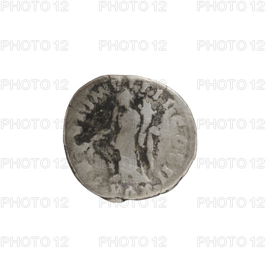Denarius of Lucius Verus 130–169; Roman emperor 161–169. Obverse: Head of Lucius Verus in a laurel wreath facing right, legend L VERVS AVG ARM - PARTH MAX. Reverse: Pax standing left, holding a branch in his right hand and a cornucopia in his left, legend TR P VI IMP IIII COS II. Iconography includes twigs, personifications Pax, cornucopias. Episode: PAX, 166. Roman Empire, Rome mint. Coin: diameter ~17.5–18.5 mm, weight 2.95 g, axis 195°., A round, worn metallic object with an uneven surface and irregular edge, showing a mix of gray and darker gray areas; the object has patches of darker discoloration and lighter worn highlights, and a faint suggestion of raised and recessed shapes across its face.