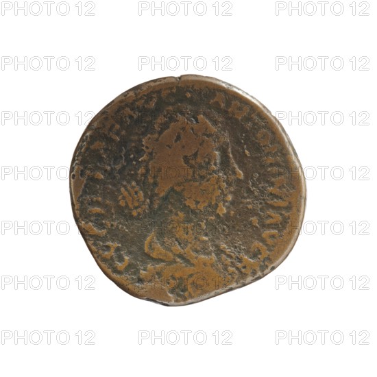 sestertius; issuer: Lucilla 149–182, wife of Lucius Verus 130–169 — Roman empress 164–169. Obverse: draped bust of Lucilla facing right, inscription LVCILLAE AVG - ANTONINI AVG F. Reverse: Hilaritas personified standing, head turned left, right hand holding a long palm branch, left hand holding a cornucopia; inscription HILARITAS, control marks in fields SC. Date: 164–169 CE, Rome. Coin sestertius, diameter ~29–31 mm, weight 21.65 g, axis 0°., A round, worn coin with an uneven edge showing a mottled surface of brown and dark brown tones, with lighter coppery-brown patches and some darker greenish-brown areas; faint, irregular raised shapes and worn relief suggest an indistinct central figure and surrounding markings, and the coin sits against a plain white background.
