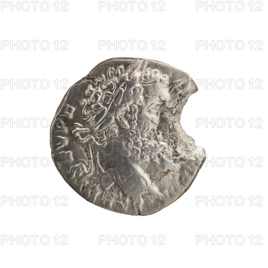 Denarius, Septimius Severus 146–211; Roman emperor 193–211 issuer. Head of Septimius Severus in laurel wreath facing right. Legend: L SEPT SEV PE - RT AVG IMP III all around. Reverse: Pax seated left, holding a twig in his outstretched right hand, cornucopia in his left; legend PACI AV - GVSTI all around. Date: 194. Place: Rome, Roman Empire. Coin; diameter 16.0–17.5 mm, weight 2.37 g, axis 15°., A worn round metal object with irregular edges and a chunk missing along one side, showing a raised profile of a human head in relief with textured curly hair and facial features that are partially eroded; the surface displays scratches, pits, and areas of corrosion; the predominant colors are metallic silver and gray with small patches of darker gray and subtle greenish-blue corrosion; the background is plain white.
