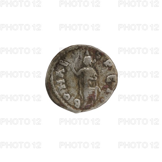 Denarius depicting Roman deities and Spes personification; Septimius Severus Roman emperor; 146–211. Date: 194. Place of origin: Emesa, Roman Empire 27 BC–476. Medium/object: coin; mint: Emesa. Dimensions: diameters 17.0 mm and 18.5 mm; weight 2.57 g., A round, worn coin with a metallic gray and brown patina showing a raised central figure standing and holding an object, surrounded by a ring of raised impressions; the surface shows areas of darker brown and subtle reddish discoloration along the edges and on parts of the face, with lighter silvery highlights on raised details.