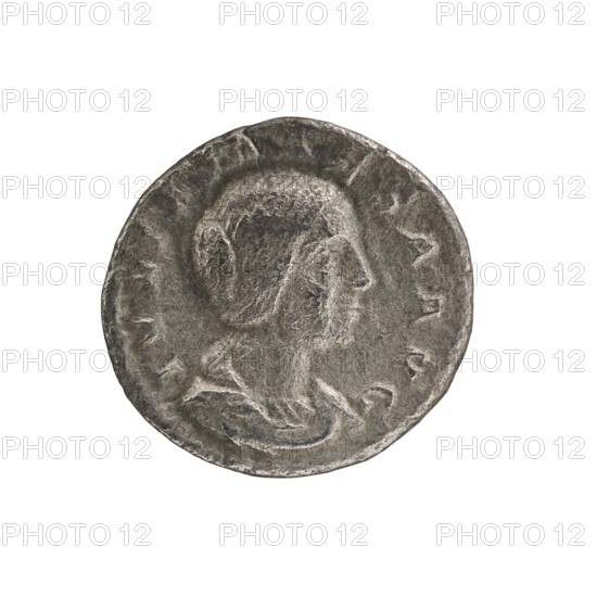 Denarius, Julia Maesa ca. 160–224; Augusta 218–224. Obv.: IVLIA MAESA AVG — draped bust of Julia Maesa facing right, pearl rim. Rev.: PVDICITIA — veiled Pudicitia seated on a throne facing left, raising the hem of her veil with her right hand, holding a scepter in her left, pearl rim. 218–222. Coin: diameter 17.5–18.5 mm, weight 2.61 g., A single round coin with a worn relief profile of a person's head facing right, showing textured hair and facial features, set against a plain background; the coin's surface appears aged and uneven with raised rim details and irregular edges. The visible colors are shades of gray, silver, and darker gray tones.