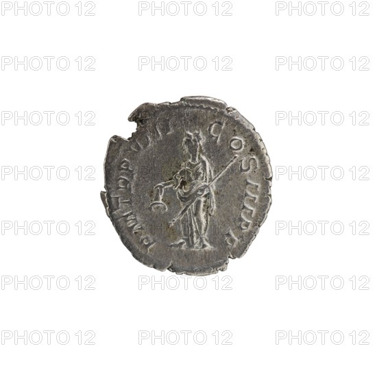Denarius of Alexander Severus 208–235; Roman emperor 222–235. Obverse: bust of Alexander Severus Roman emperor; 222–235 — iconography. Reverse: personification Libertas. Date: 229, Rome. Material: coin denarius. Diameter: 18.5–19.0 mm. Weight: 2.65 g. State: Roman Empire 27 BC–476., A single circular coin with an irregular, worn edge sits centered on a white background; the coin has a metallic gray surface with darker gray patina and small greenish spots, and shows a raised depiction of a standing robed figure holding a long staff and an object in the other hand, with textured wear and small nicks around the rim.