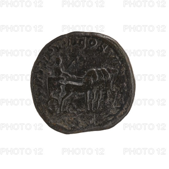 Dupondius, quadriga, Alexander Severus Roman emperor; 222–235 — iconography: emperor on quadriga; dated 229; Roman Empire 27 BC–476, Rome; coin; diameter 24.5–25.0 mm; weight 13.71 g, A round dark coin with a worn surface showing a low-relief scene of a person seated on a chariot pulled by a pair of animals, the details appearing eroded and textured; the coin's color is mainly dark brown to black with some lighter grayish highlights where the relief catches light, and there is a narrow lighter rim around parts of the edge.
