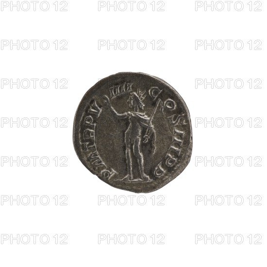 Denarius: Roman deities, Sol; Alexander Severus Roman emperor, 222–235 — iconography; dated 230; Roman Empire 27 BC–476, Rome mint; coin; diameter 18.0–19.0 mm; weight 2.11 g, A round metallic coin with a dark gray surface and lighter silver highlights showing wear, featuring a raised central figure of a standing person holding a long staff in one hand and gesturing with the other; the figure appears detailed with a headdress or rays around the head and drapery or garment outlines on the body. The coin edge has an irregular, slightly worn rim and raised decorative border elements. The background is plain white, and the visible colors are dark gray and silver.