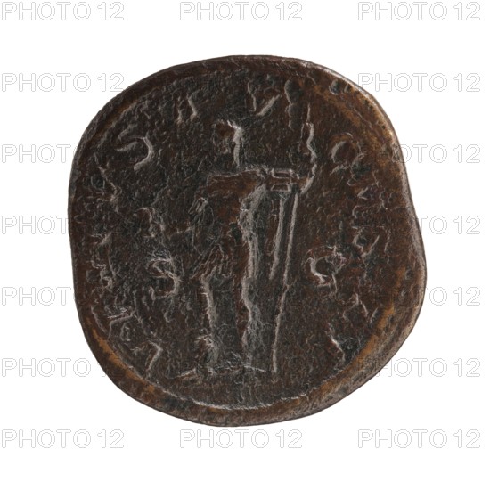 sestertius; personifications; Alexander Severus Roman emperor, 222–235; iconography: Virtus personification; date: 228–231; place of origin: Roman Empire 27 BC–476, Rome; object type: coin sestertius; dimensions: diameter 28.5–30.0 mm; weight 20.01 g, A round, worn dark brown object with a rough textured surface showing a faint raised outline of a standing human figure holding a long vertical element; the object has uneven edges and areas of lighter brown and black patina across its surface, with subtle highlights of reddish-brown and gray.