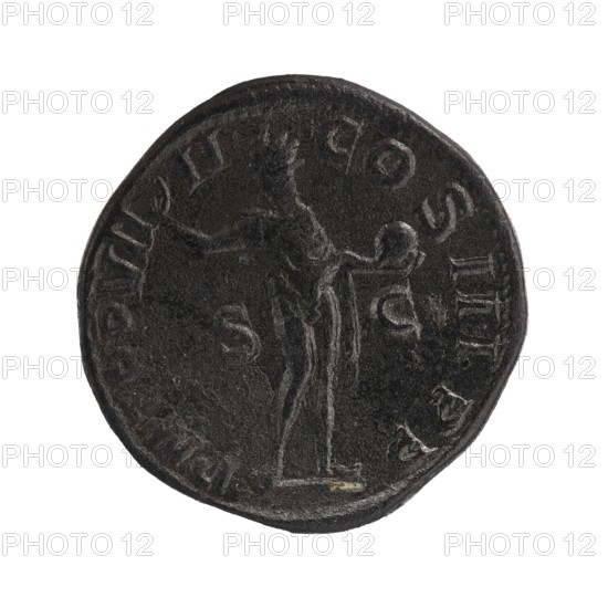 Sestertius; Sol mythology; Alexander Severus Roman emperor, 222–235 — iconography, Roman deities; 230; Rome; Roman Empire 27 BC–476; coin; diameter 29.5–30.0 mm; weight 19.44 g, A dark round object with a slightly irregular edge, showing a raised depiction of a standing human figure in profile with one arm extended and the other holding a rounded object, all in shades of dark gray and black with lighter gray highlights and a small spot of pale yellow near the bottom edge.