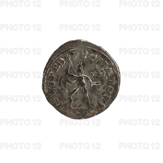 Denarius depicting Roman deities and Jupiter; obverse with Alexander Severus Roman emperor; 222–235 — iconography dated 228–231; Roman Empire 27 BC–476, Rome mint; coin, diameter 19.0 mm, weight 2.27 g, A round, worn coin with a dark metallic surface showing areas of lighter silver and patches of brownish-green tarnish; the coin features a raised central figure standing with one arm raised and the other extended, a draped garment across the torso, and a circular raised border with irregular indentations around the edge.