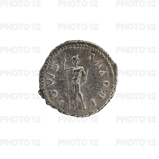 Denarius depicting Roman deities and Jupiter; obverse: Alexander Severus Roman emperor, reign 222–235; iconography dated 228–231. Roman Empire; minted in Rome. Coin. Diameter 19.0–20.5 mm; weight 2.62 g., A round metallic object with a worn, uneven edge sits centered on a white background; the object appears mostly silver-gray with darker gray areas and faint brownish tones, and shows a raised, weathered relief of a standing human figure holding a long vertical object, with textured rim details and patches of shadow and slight discoloration across its surface.