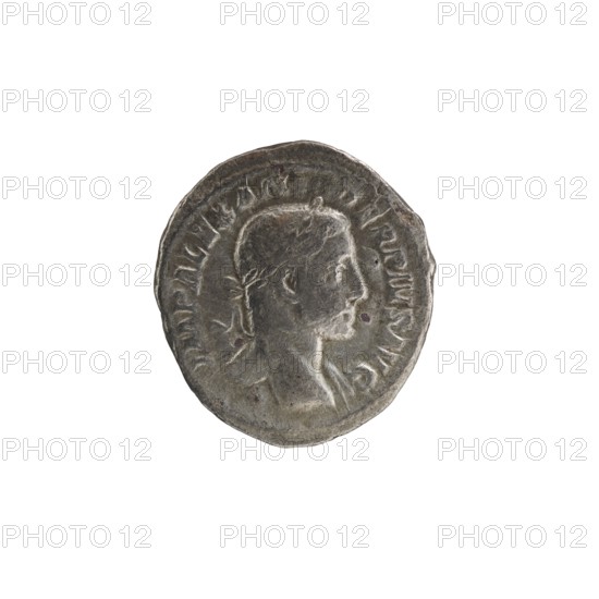 Denarius, Alexander Severus 208–235; Roman emperor 222–235. Issuer: Alexander Severus. Obverse iconography: portrait of the emperor. Reverse: Providentia personification. Date: 231–235. Place: Rome, Roman Empire 27 BC–476. Coin; diameter 19.0–20.0 mm; weight 3.27 g., A round metallic object with a worn, textured surface showing a raised profile of a person facing right; the profile includes facial features, a short hairstyle with a small tied detail at the back, and a suggestion of clothing at the neck. The object is primarily gray with darker and lighter silver variations and small areas of brownish discoloration, set against a plain white background.
