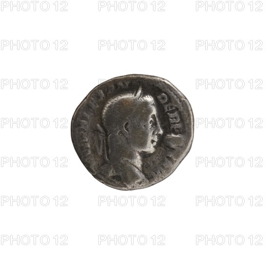 Denarius, Alexander Severus 208–235; Roman emperor 222–235. Issuer: Alexander Severus Roman emperor; 222–235. Obverse iconography: personifications, Virtus. Date: 231–235. Place of creation: Rome, Roman Empire 27 BC–476. Coin; diameter 17.0–19.0 mm; weight 3.26 g., A circular metal coin shown against a white background, with a raised profile of a person facing right; the coin surface is worn and textured with visible ridges and indentations, and the portrait area shows contours of a head, neck, and shoulders. The coin appears in shades of silver and gray with darker gray patina in recessed areas and lighter silvery highlights on raised surfaces.