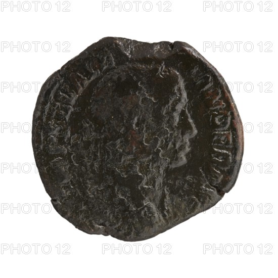 sestertius, Alexander Severus Roman emperor; 222–235 - iconography, personifications, Annona personification, 228–231, Roman Empire 27 BC–476, Rome; coin; diameter 28.5 mm, diameter 30.0 mm; weight 21.21 g, A round, worn object with an uneven edge showing a profile of a human face in low relief; the surface appears rough and pitted with irregular texture and areas of raised detail; the predominant colors visible are dark brown and black with hints of reddish-brown and subtle lighter highlights; the object sits against a plain white background.