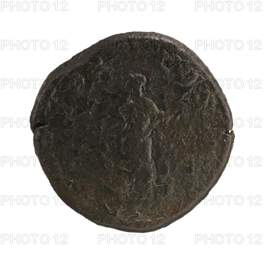 sestertius; personifications; Alexander Severus Roman emperor, 222–235 — iconography: Annona personification; 231; Roman Empire 27 BC–476, Rome; coin; diameter 29.0–30.5 mm; weight 19.65 g, A round, flat object with an uneven, rough surface and edges, showing a dark, mottled appearance with shades of black, brown, and hints of gray and reddish-brown; the surface has a textured, worn look with a few small irregular pits and subtle raised areas, and some fine fibrous or lint-like particles visible against a plain white background.