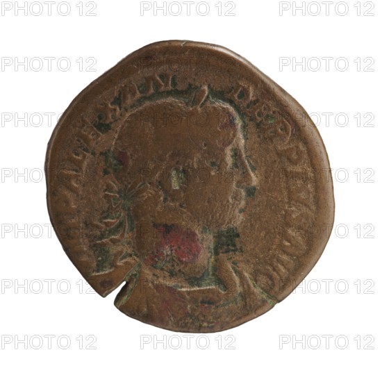 Sestertius of Severus Alexander Roman emperor 222–235 CE. Obverse: issuer Severus Alexander — titles and imperial portrait. Reverse: Jupiter Roman deity iconography. Date: 231–235 CE, Rome Roman Empire, 27 BCE–476 CE. Medium: coin sestertius. Measurements: diameter ~29–30 mm, weight 19.42 g., A round, worn coin with a raised profile of a person facing right, showing a head, neck, and shoulder area; the coin surface is textured and has areas of wear and corrosion with visible rough patches and small dents; colors visible include brown, green, and red, with some darker and lighter brown variations across the surface; the coin edge is irregular with a small notch and a slightly flattened section.