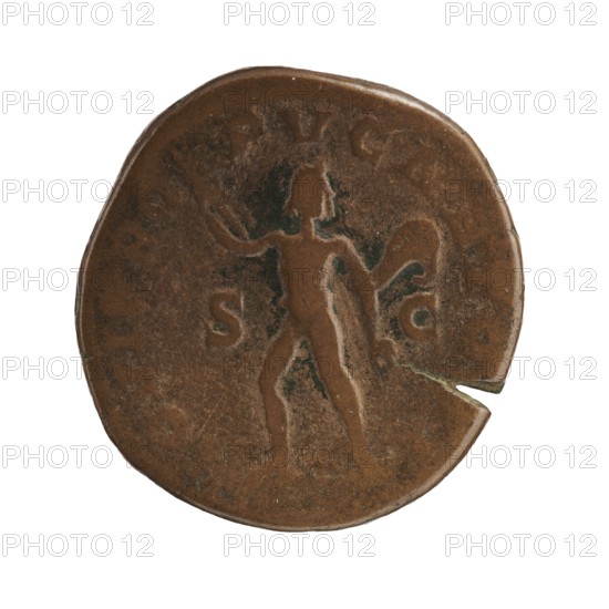 Sestertius of Severus Alexander Roman emperor, 222–235 CE. Obverse: issuer Severus Alexander; iconography includes Roman deity Jupiter. Date: 231–235 CE, Rome, Roman Empire. Coin sestertius. Diameter ~29–30 mm; weight 19.42 g., A round, worn coin with an irregular edge and a small notch on one side, shown against a white background; the coin is mostly brown with areas of darker brown and some greenish patina; a raised, simplified human figure is visible in the center with an arm extended and a draped or curved shape near the other arm; the surface shows uneven texture, small pits, and smooth worn areas.