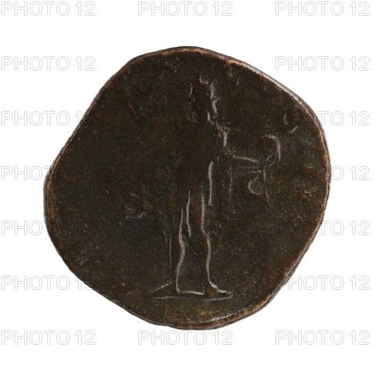 Sestertius; Roman deities; Sol; Alexander Severus Roman emperor, 222–235 — iconography; 231 CE; Roman Empire; minted in Rome; coin; diameter 27.5–30.0 mm; weight 18.15 g, A round, worn object with an uneven edge and a dark brown surface showing areas of lighter brown and black tones; faint raised outlines form the shape of a standing human figure with long vertical elements suggesting draped clothing and an arm extended holding a small round object, all on a plain white background.