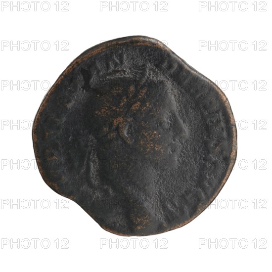 Sestertius coin depicting Sol mythology; obverse associated with Alexander Severus Roman emperor, 222–235; iconography of Roman deities; dated 231; Roman Empire 27 BC–476; mint: Rome; coin; diameter 27.0–29.0 mm; weight 15.12 g, A round, worn coin-like object with an uneven edge, primarily dark gray to black in color with a patina of brownish-orange spots and highlights, showing a faint raised profile of a human head in the center and subtle textured surface variations across the face, set against a white background.
