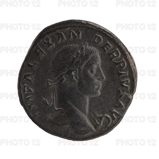 Sestertius; Roman deities; Victoria mythology; Alexander Severus Roman emperor, 222–235 — iconography; dated 231, Rome; creator role: mint; Roman Empire 27 BC–476; coin; diameter 28.0–30.0 mm; weight 16.86 g., A dark round metal coin with a raised profile of a person facing right, showing short textured hair and a laurel wreath, with raised decorative elements around the edge; the visible colors are dark gray, black, and hints of brown.