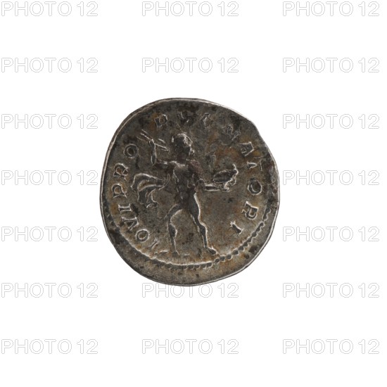 Denarius of Alexander Severus 208–235; Roman emperor 222–235. Obverse: Alexander Severus; Reverse: Jupiter Roman deity. Date: 231–235. Origin: Rome, Roman Empire. Medium: coin. Diameter: 19.0–19.5 mm. Weight: 2.52 g., A circular metallic object with a worn, uneven surface and a raised rim sits against a white background; the object shows a central human-like figure in a dynamic pose with limbs extended and drapery or ribbons flowing, and the metal displays shades of dark gray, brownish rust, and lighter silvery highlights.