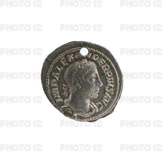 Denarius with hole, Alexander Severus 208–235; Roman emperor 222–235 issuer; Roman deities; Alexander Severus Roman emperor; 222–235 — iconography; Jupiter mythology; dated 231–235; Roman Empire 27 BC–476 — place of origin: Rome; coin; diameter 19.5 mm and 20.5 mm; weight 2.93 g, A circular metallic object with a worn silver-gray surface showing a raised profile of a bearded male figure facing right, surrounded by a raised dotted border and a decorative rim; the object has a small round hole near the top edge and exhibits irregular edges, surface scratches, and darker gray toning in recessed areas.
