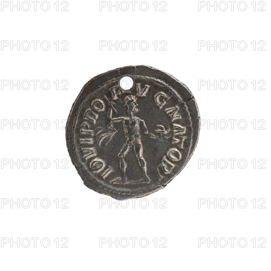 Denarius with hole, Alexander Severus 208–235; Roman emperor 222–235 issuer; iconography: Roman deities, Alexander Severus; Jupiter mythology; dated 231–235; Roman Empire; Rome mint; coin; diameter 19.5–20.5 mm; weight 2.93 g., A small round metallic object with a dark gray surface occupies the center of a white background; the object has an irregular edge and a circular hole near its top, and a raised border encircling an embossed central figure that appears to be a standing human form with outstretched arms and a headpiece, with textured worn areas and lighter silver highlights on the raised details.