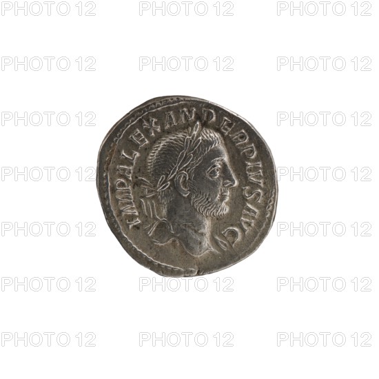 Denarius, Alexander Severus 208–235; Roman emperor 222–235. Obverse: laureate/diademed bust of Alexander Severus. Reverse: personification of Providentia. Date: 231–235 CE. Place of minting: Rome. Material: coin silver. Dimensions: diameter 19.0–20.5 mm; weight 3.18 g., A round metallic coin with a raised profile of a bearded man wearing a laurel wreath, rendered in shades of silver and gray with darker patina in recessed areas; the coin surface shows worn textures and slight irregularities at the edge, and the background is plain white.