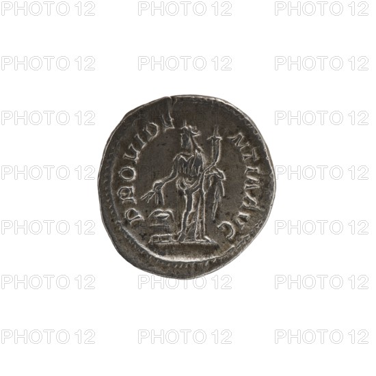 Denarius of Alexander Severus reigned 222–235 CE. Obverse: portrait of Alexander Severus Roman emperor, 222–235. Reverse: personification of Providentia. Dated 231–235 CE. Roman Empire; struck at Rome. Coin silver; diameter 19.0–20.5 mm; weight 3.18 g., A round metallic coin with a worn surface shown against a white background, the coin appears dark gray with lighter silvery highlights; it bears a raised central figure of a standing person wearing a draped garment and holding an object, with a small stepped platform near the feet and a curved raised border around the rim; the metal shows variations in tone with areas of darker gray patina and brighter silver along raised edges and details.