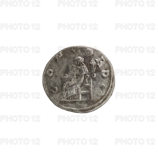 Denarius of Alexander Severus 208–235; Roman emperor 222–235. Obverse: bust/portrait of Alexander Severus issuer; Reverse: Roman deities—Concordia personification, iconography associated with Alexander Severus. Date: 222–235. Place of origin: Antioch on the Orontes, Roman Empire. Object type: coin denarius. Dimensions: diameter 17.5–18.0 mm; weight 3.26 g., A round metallic coin with a worn surface in shades of gray and silver, showing an embossed seated figure facing left on a raised platform or chair with drapery details, surrounded by a ring of raised edge and a few raised circular and irregular shapes around the perimeter.