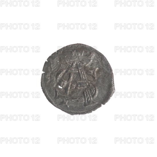 Lithuanian obol, Sigismund II Augustus King of Poland; 1544–1572. Jagiellon dynasty. Polish coin. Obverse: in the border under the ducal mitre a tied monogram composed of the letters SA. Reverse: in the border a shield with the Columns of Gediminas coat of arms; above the shield the year 1547. Grand Duchy of Lithuania; Vilnius; Poland. Coin., A round, worn coin with an uneven edge sits on a white background; the coin surface appears dark gray with lighter gray highlights and a few small areas of brownish discoloration, and faint raised designs and grooves are visible across its face giving it a textured, slightly rough appearance.