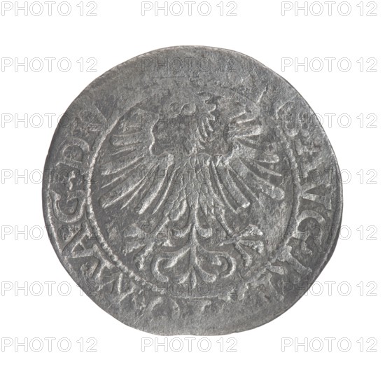 Lithuanian half-grosz, Sigismund II Augustus King of Poland; 1544–1572. Silver coin half-grosz, 1562. Obverse: Polish eagle; in the rim between pearl borders the inscription ..GIS.AVG.REX.PO.MAG.DV.... Reverse: Lithuanian Pursuit Pahonia, below the year 1562; in the rim between pearl borders the inscription .MONETA..... ..CAT9.LITV. Minted in Vilnius, Grand Duchy of Lithuania. Emblems: Jagiellon dynasty, eagles., A round metallic object with a textured surface showing wear and scratches, primarily gray in color with darker and lighter gray variations; the object features a raised central motif resembling a stylized bird with spread wings and decorative feather details, surrounded by an outer ring containing raised decorative elements and shapes; the edge of the object is slightly irregular and shows unevenness and small dents.
