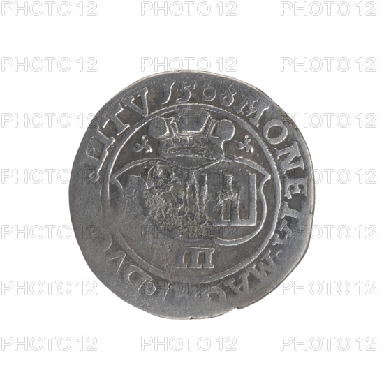 Lithuanian four-piece, Sigismund II Augustus King of Poland; 1544–1572 author, coats of arms, Jagiellons dynasty, Polish coins, Pogon coat of arms; Lithuania, male busts, royal bust iconography, Columns of Gediminas coat of arms, Sigismund II Augustus King of Poland; 1520–1572 - iconography. Obverse: Crowned male bust in armour turned right, inscription around: .IGIS...DG.REX.PO.MAG.DVX.. Reverse: Under the prince's mitre, two coats of arms with the Pogon and Columns of Gediminas coat of arms, below the value number IIII; in the rim the inscription: MONETA.MAGNI.DVC...LITV 1568. 1568. Grand Duchy of Lithuania; coin., A round metal coin with a worn surface and a raised central design showing a shield topped by a crown and flanked by decorative elements, all within a circular border; the coin appears primarily silver-gray with darker gray areas in recessed parts and slight brownish discoloration near the edge, and the rim shows irregularities and small nicks.