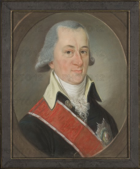 Portrait of Michal Tadeusz Morykoni by Józef Mateusz Pigulski 1724–1817, pastel, after 1777. Depicts Michal Tadeusz Morykoni 1720–1788 in 18th-century costume; includes iconography of the Order of St. Stanislawa., A framed portrait of a man shown from the chest up wearing a dark coat with a high pale collar and a white cravat with ruffled lace, a red sash draped across his chest, and a decorative silver-toned star-shaped badge near the sash; he has pale skin with rosy cheeks, light gray hair styled back and curled at the sides, light-colored eyes, and a slight closed-mouth expression, set against a muted gray-brown oval background within a dark rectangular frame; visible colors include gray, pale pink, white, cream, dark blue-black, red, silver, and brown.