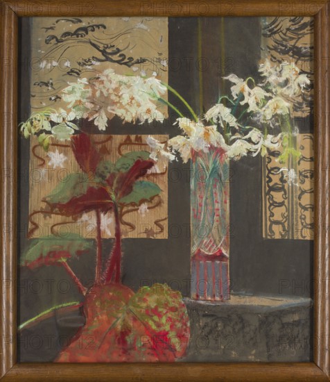 White orchids and begonia, Leon Wyczólkowski 1852–1936, painter. Still life, Japonism / Young Poland style, 1910, Kraków. Pastel, 72 × 62.5 cm. Polish painting; subject: flowers., A framed artwork showing a still life scene with a tall decorative vase holding a group of drooping white flowers with green stems, placed against a background of patterned panels. A large potted plant with broad leaves in shades of deep red, green, and orange sits to the left, its stems and foliage extending upward. The vase displays vertical decorative stripes and muted colors including teal and red, and it stands on a dark surface. The background panels include ornamental brushwork and patterns in beige, black, and brown tones, with areas of swirling black marks and lighter beige sections. The overall color palette includes white, green, red, orange, beige, brown, black, and teal.