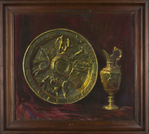 Bowl and jug used for the liturgy of Maundy Thursday; artist: Leon Wyczólkowski 1852–1936 painter; maker: Krzysztof Chodkiewicz ?-1652, artistic crafts/goldsmithery; subject: bowls, jugs, Holy Thursday; style: mannerism craft, Young Poland; themes/personifications: four elements, Italy, Germania, Spain, France; medium: pastel; date: 1907; dimensions: height 79 cm, width 89 cm; place of origin: Kraków., A framed painting showing a large round decorative plate and a covered ewer displayed against a dark red and burgundy background. The plate has a raised central boss and radiating sculpted forms with reflective highlights in bright gold and yellow tones, with areas of darker greenish-gold and muted brown. The ewer beside it is tall with a curved handle and spout, painted in similar gold and yellow highlights with darker greenish and brown shadows. The surface beneath the objects appears draped with cloth in deep red and burgundy with touches of purple and darker maroon, and the frame aro...