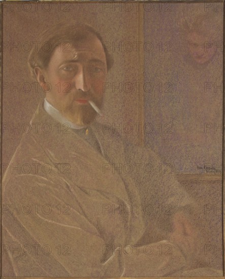 Self-portrait with a cigarette; Leon Kaufmann Kamir, 1872–1933; pastel drawing; 1919; self-portrait of a male painter smoking a cigarette; height 61.5 cm, width 51 cm; Polish pastels; Vevey., A seated man with a light brown beard and mustache looks toward the viewer while holding a cigarette in his mouth; he has brown hair and visible facial shading in tones of peach and reddish-brown, and he wears a light-colored coat with soft folds and a dark collar beneath it. The background shows a muted wall in shades of brown and purple with a faint image of another face in the upper right, and the overall palette includes browns, beiges, purples, and touches of white and red.