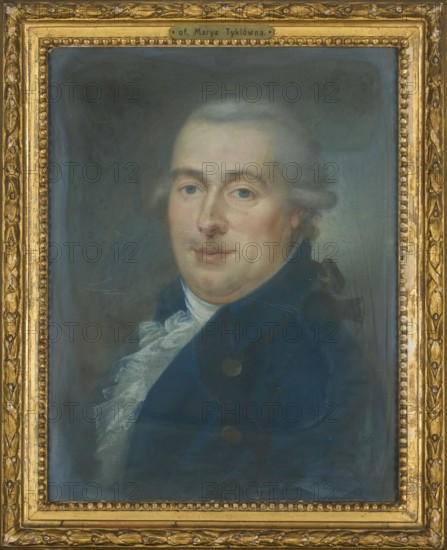 Portrait of Franciszek Tykl; pastel; depiction of a male merchant/bourgeoisie, dated 1788–1794; inscriptions note: Portrait of Ludwika Gutze Waniewska: née Honwald, 1st voto of Franciszkowa Tyklowa, 2nd voto of Józefowa Kalasantowa Jerzejowiczowa; artist, related to Tykiel, Franciszek ante 1770–1832 and Tykiel, Maria fl. 1917., A framed portrait of a man shown from the chest up wearing a dark blue coat and a white ruffled shirt, with pale skin, light gray hair styled back, and blue eyes; the background is a muted grayish-blue, and the ornate frame around the painting is gold.