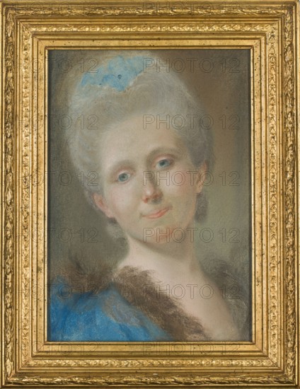 Portrait of Johanna Juliana Frederica née Richter Bacciarelli; artist: Marteau, Louis François ca. 1715–1804 pastelist?; date: after 1770; medium: pastel on paper/drawing; dimensions: height 38 cm, width 26.5 cm; subject: Frederica Bacciarelli née Richter, 1733–1811; iconography: female portrait in 18th-century costume; notes: new attribution; related person: Choiseul-Gouffier, Alix de, Countess Janzten 1832–1915., A framed portrait of a woman shown from the shoulders up, with pale skin and light gray hair styled high and adorned with a faint blue accent, wearing a blue garment with a dark brown fur trim; her expression is gentle with slightly upturned lips and light-colored eyes, and the background is a muted gradient of gray and brown.