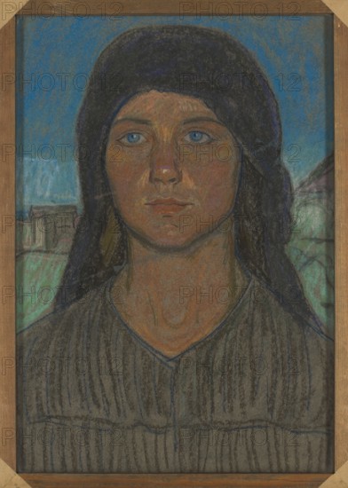 Study of a Peasant Woman, Jan Rembowski 1879–1923, 1919. Pastel on dark gray cardboard, 47.5 x 31.8 cm in the frame. Female portrait of a peasant woman; executed with colored pastels with the ground color consciously integrated into the composition. Rembowski outlined the figure with strong, sharp pastel lines, built the face with a thicker, smoothly rubbed layer of pastel, and added pink and white highlights and reflections. Related compositional studies of peasants appear in Rembowski’s 1917 sketchbook, showing progression from realistic studies to simplified, monumentalized designs; the back of the work’s binding bears a label inscribed Study, pastel with the submission date 1/9/1919. Inv. no. 185070. EM, pastel, drawing; height 48.5 cm, width 34.5 cm., A framed portrait of a person with dark hair covered by a dark headscarf against a blue background, showing a face with warm brown and reddish skin tones, blue eyes, and neutral lips, wearing a dark, vertically striped garment in sha...
