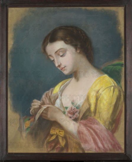 The Seamstress, Hipolit Pinko 1836–1901. Sewing genre scenes; women's portrait; after 1870; pastel; 71.0 × 57.5 cm; includes flowers; genre scene., A painted portrait of a young woman with brown hair styled in a braid, shown in three-quarter view with a pale complexion and downcast eyes; she wears a yellow garment with a pink sleeve and a green fabric visible behind her, and holds fabric and a needle near her chest where a pink flower is placed; the background is a muted blue surrounded by a golden-beige edge, and the whole image is set within a dark wooden frame.