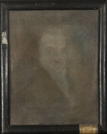 Portrait of Michal Walicki, unknown author, pastelist; Michal Walicki 1746–1828 – male portrait, after 1800; pastel drawing; height 20 cm, width 16 cm., A framed, faded portrait of a person rendered in soft, muted tones, with a hazy oval face and indistinct features centered in the composition; the figure is surrounded by a diffuse background with blended areas of brown, gray, green, and warm ochre, and the face shows paler flesh tones with touches of reddish color at the mouth and subtle bluish highlights near the neck. The wooden frame is dark, worn black with scuffs and lighter worn patches, and there is a small aged paper label attached to the lower edge of the frame.