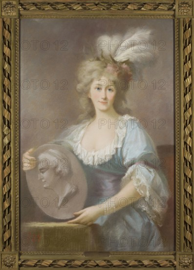 Portrait of Anna Charlotte Dorothea von Medem Biron, Duchess of Courland; after 1792 after an oil portrait by Marcello Bacciarelli, 1731–1818. Pastel, height 94.5 cm, width 64 cm. Copy attributed to Gustav Friedrich Amalius Taubert 1755–1839 copyist; possible unknown pastelist. Depicts Biron in 18th-century costume, en pied, wearing jewelry; iconography related to Stanislaw August Poniatowski and Dorota née von Medem 1761–1821. Restitution; gift; copies imitations., A portrait of a woman wearing a light blue dress with white lace trim and a purple sash, seated or standing against a muted brownish-gray background, her pale skin and rosy cheeks framed by voluminous blond hair adorned with white feathers and a small pink flower; she holds a round, grayish medallion or plaque showing a sculpted male profile and rests one hand on a brownish surface while the other supports the medallion, wearing a strand of white pearls on her wrist; the image is set within an ornate gold frame with braided...