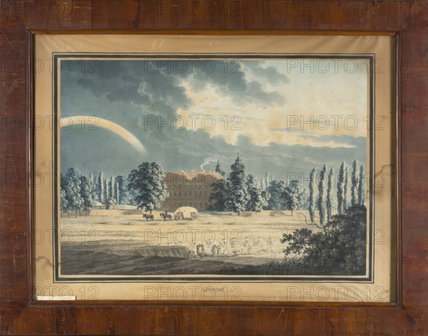 Landscape with a Castle in Lancut, Joseph Richter 1780–1837, ca. 1820. Watercolor drawing, 51.4 × 74.4 cm frame 81.5 × 104.2 cm. Depicts Lancut: baroque castle and architecture, gardens, peasants, horse-drawn carriages, harvest, rainbow. Related names: Artur Potocki 1787–1832, architects Matteo Trapola ante 1590–1637 and 17th-century figures, Szymon Bogumil Zug 1733–1807., A framed landscape scene shows a large building partially obscured by a group of tall trees and a few clustered shorter trees, with a dramatic cloudy sky overhead and a pale curved arc in the sky. In the foreground there is an open field with several figures working in a line and a covered wagon drawn by animals with a couple of people nearby; a group of trees with dense foliage appears to the right. The color palette includes muted blues, grays, beige, brown, and hints of pale yellow, with the frame and mat in brown and tan tones.