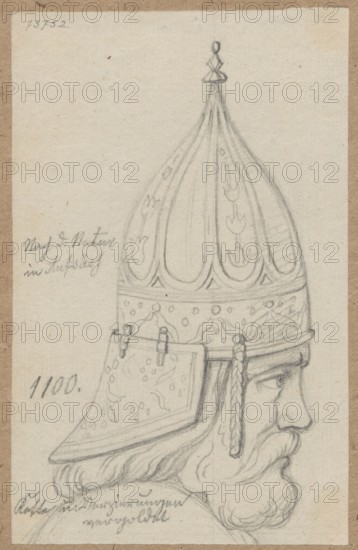 Head of a man in profile in a helmet, drawing, circa 1100; draughtsman Aleksander Lesser 1814–1884. Subject: helmets, militaria, army, armor, knights' armor; 11th century. Drawing glued with the upper edge to brown cardboard. Medium: drawing/sketch. Sheet: height 13.4 cm, width 8.5 cm; cardboard: height 34.6 cm, width 24.8 cm. Date of draughtsmanship: 1830–1884., A pencil sketch on a beige paper background shows a profile of a bearded man wearing an ornate pointed helmet with a decorative finial on top and patterned panels; the helmet has a flared neck guard and a braided strap hanging beside the ear. The man's face features a prominent nose, visible eye with a focused expression, and a full mustache and beard with flowing, curved hair lines. The drawing uses shades of gray pencil, with the paper showing light tan and off-white tones.